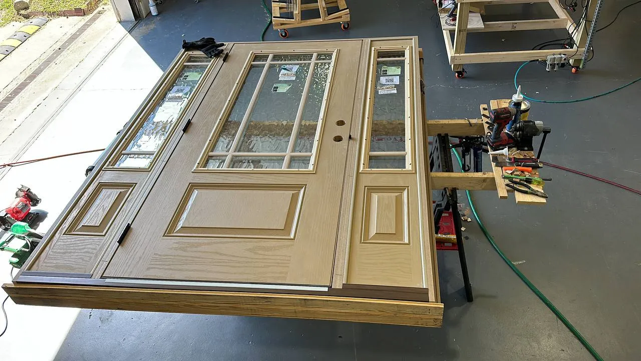 Custom craftsman entry door being prepared for installation