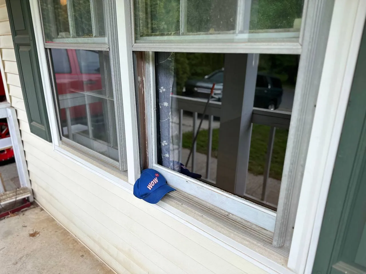 New glass installed in repaired window frame